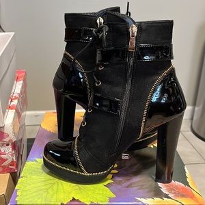 Black booties purchased from Akira